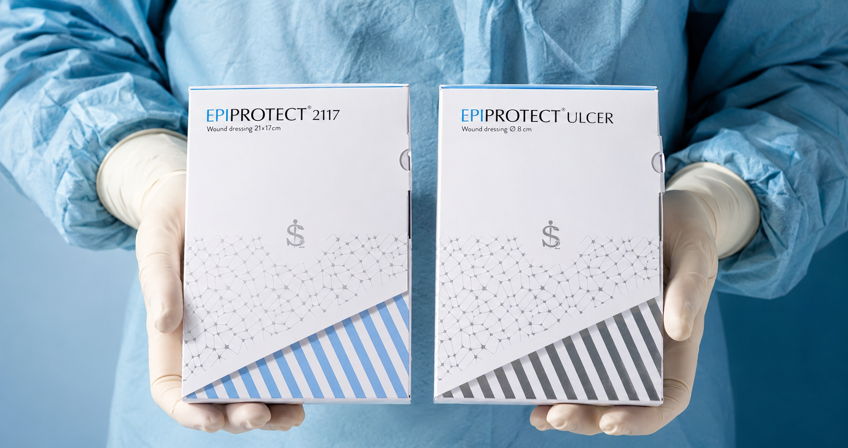 EPIPROTECT® 2117 and EPIPROTECT® Ulcer wound dressing boxes held by a healthcare professional
